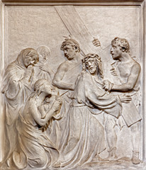 Fototapeta na wymiar Brussels - Stone relief of Jesus meet the women of Jerusalem