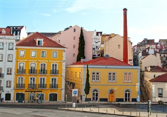 Fototapeta na wymiar Traditional colorfull hauses in front of the Assembleia da Republica in Lisbon, Portugal