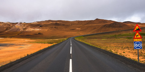 Isolated road and Icelandic colorful landscape at Iceland, summe