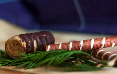 Chocolate sweet rolles. Sweet chocolate biscuits, cookies lot to the table. Chocolate rolls with white stripes. Very tasty and sweet.