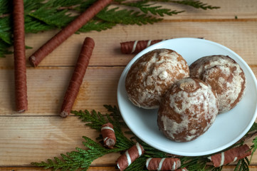 Sweet chocolate biscuits, cookies lot to the table. Chocolate rolls with white stripes. Very tasty and sweet.