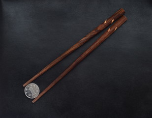 yuan coin china currency money with chopstick