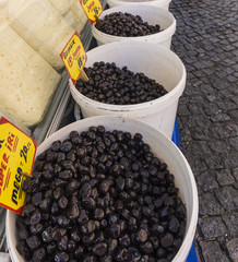 Fototapeta na wymiar buckets of olives for sale at neighborhood farmers market in Istanbul, Turkey 