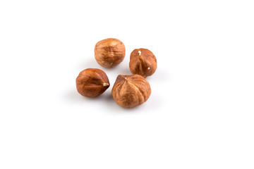 Hazelnuts on the white background