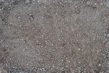Top view on braun ground surface. Dirty background texture