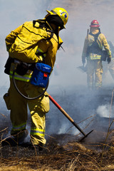 Wildland Firefighter fighting grass fire