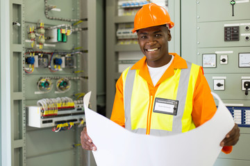 senior technical worker in substation control room