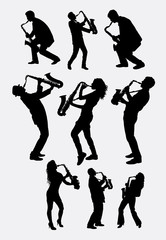 Saxophone instrument player silhouette. Male and female saxophonist poses. Good use ror symbol, logo, web icon, mascot, sticker design, sign, or any design you want. Easy to use. - 102698182