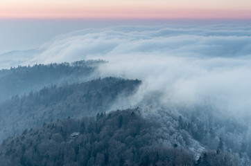 Carpathian mountains. Gorce in the clouds, seen from Luban mountain in Beskidy, Poland