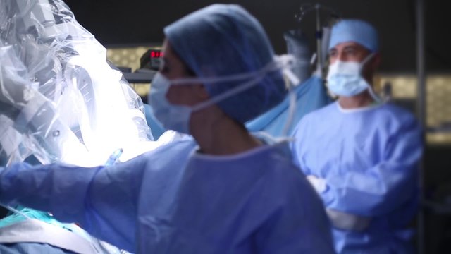 Medical operation involving robot. Robotic Surgery. Medical robot - Stock Video