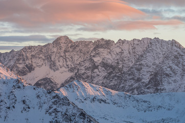Colorful mountain sunset panorama at winter in High Tatras