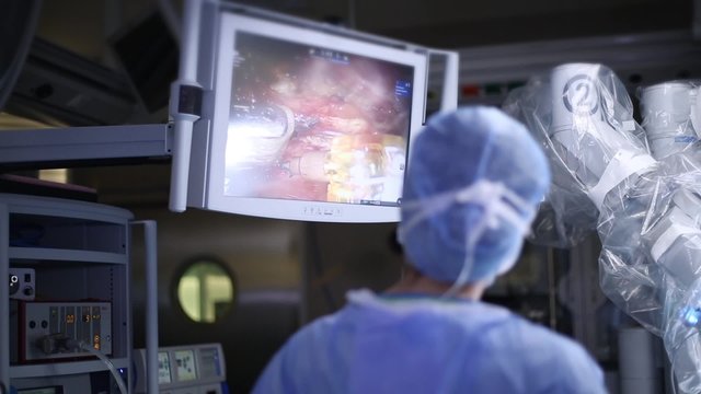 Medical operation involving robot. Robotic Surgery. Medical robot - Stock Video