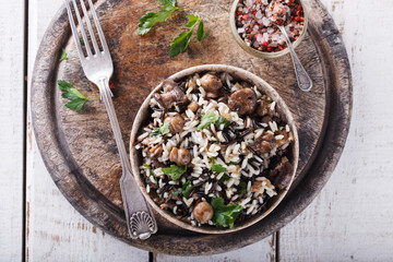 Salad of white and wild rice with mushrooms and herbs.selective focus.
