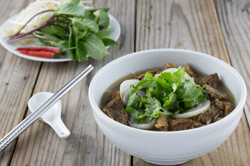 A bowl of Vietnamese pho noodle with beef brisket