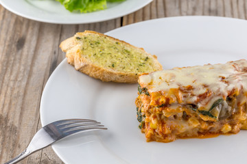 Lasagna with garlic bread 