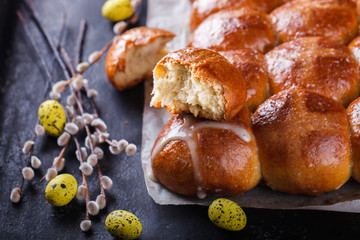 Easter Hot Cross Buns on a dark background.selective focus.