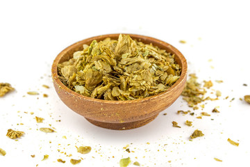 Dried Hops in a wooden bowl