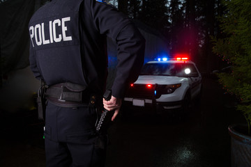 Police Officer grabbing his gun