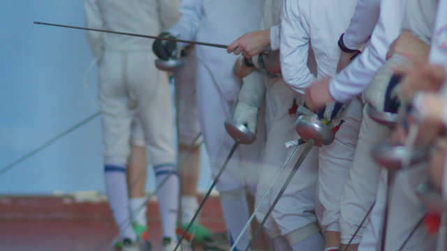 many fencers with rapiers before competition