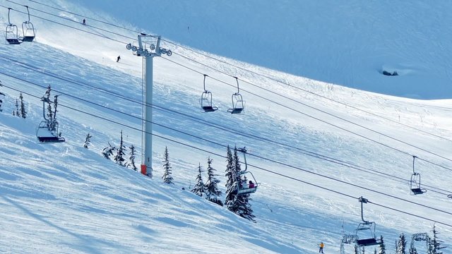 Ski Lift On Sunny Mountainside