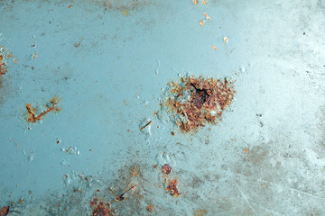 Old cracked paint pattern on rusty background