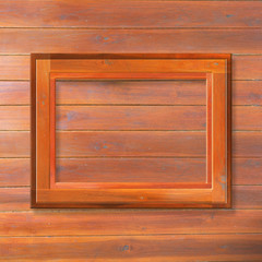 Wooden frame on wooden background