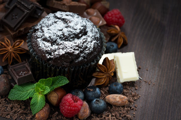 chocolate muffins with icing sugar and sweet ingredients 