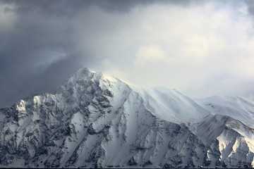 snowstorm in the mountains in winter
