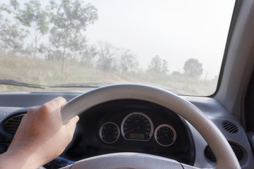 hands on steering wheel, inside car ,drive in desolate