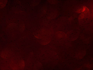 Romantic dark red bokeh and water drop on glass mirror