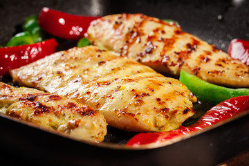 Chicken breast fillet in the pan