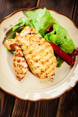 Grilled chicken breasts served with grilled paprika