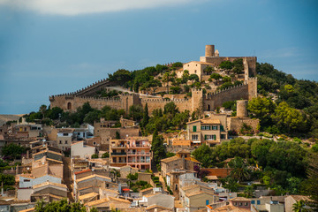 Fototapeta na wymiar Capdepera castle on green hill in Mallorca 