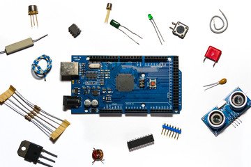 mega board surrounded by components on white background