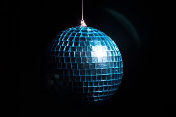 Blue disco ball in shadow 