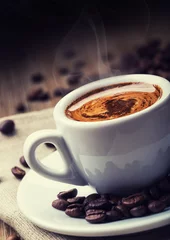 Foto auf Acrylglas Coffee. Cup of black coffee and spilled coffee beans. Coffee break. © weyo