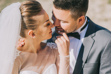 Young newly married couple posing