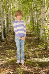 Girl in a birch grove