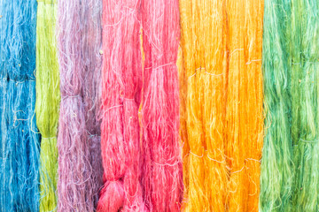 colorful of raw multicolored silk thread background