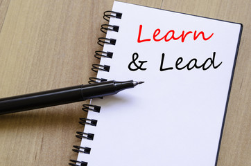 Learn & Lead write on notebook