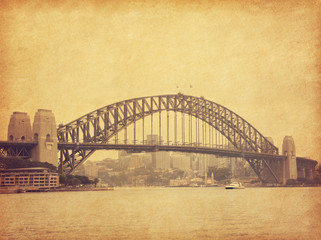 Sydney Harbour Bridge in retro style, Australia.  Added paper texture. Toned image