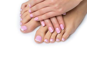 Woman hands and feet with french manicure