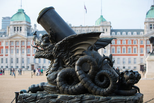  LONDON, UK - OCTOBER 4, 2016: Canon decorated with dragon,  Whitehall, Royal Horse Guard Palace