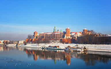Obraz premium Krakow, a view of the Wawel Castle and its reflection in the river Vistula