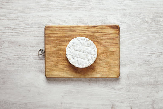 Top view camembert isolated on wooden table