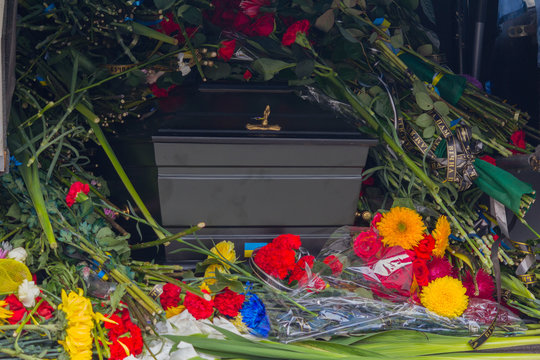Coffin flowers and Ukrainian symbols. Kiev, Ukraine