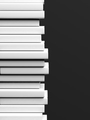 Stack of books with blank hardcover, isolated on black background.