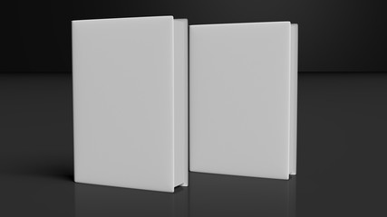 Two books with blank hardcover, isolated on black background.
