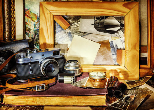 composition of vintage objects on the background of old photogra