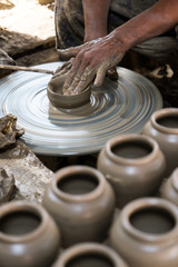 Fototapeta na wymiar Making clay pot
